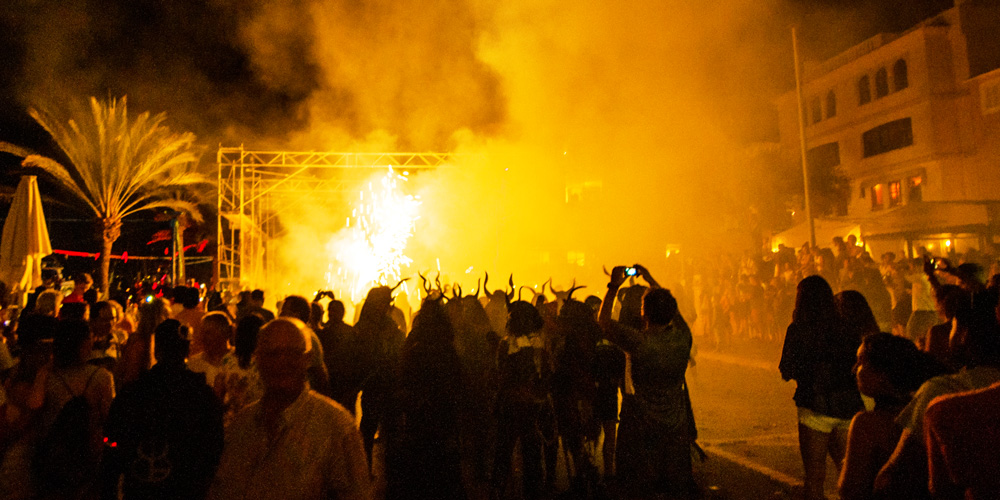 Correfoc Running fire dimonis demons carmen traditional siesta celebration street festival Trobat Andratx street festival people smile siesta celebrations Casafari real estate Mallorca neighbourhood Port andratx