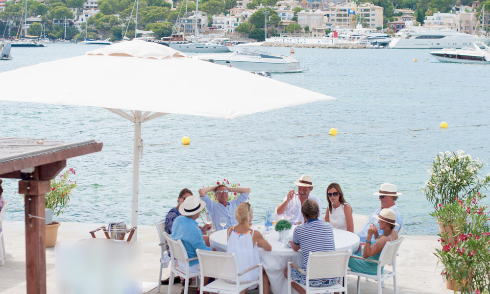 Port Andratx property buyers enjoying a great time next to the marina.