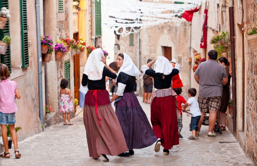 Lively streets of Valldemossa property market, Beata festival.