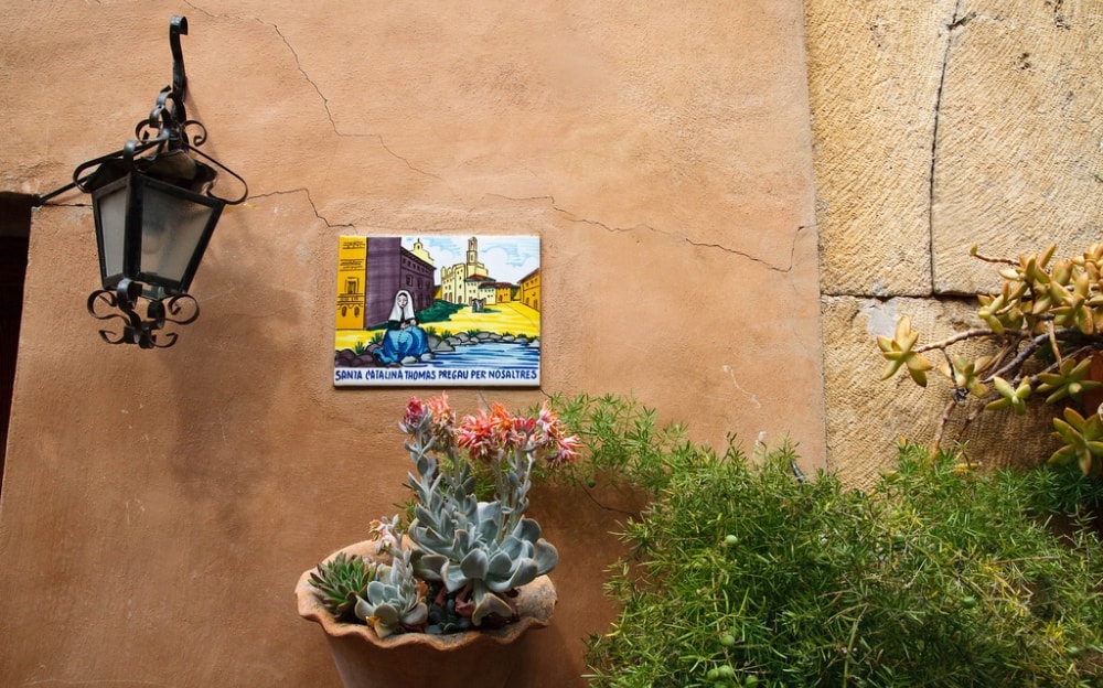 Traditional house wall of Valldemossa property market.