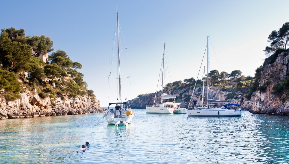 Cala Pi property owners on yachts and boats.